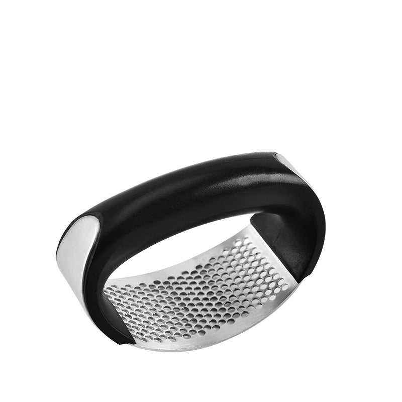 Crush garlic effortlessly with the sleek and ergonomic Stainless Steel Garlic Masher.