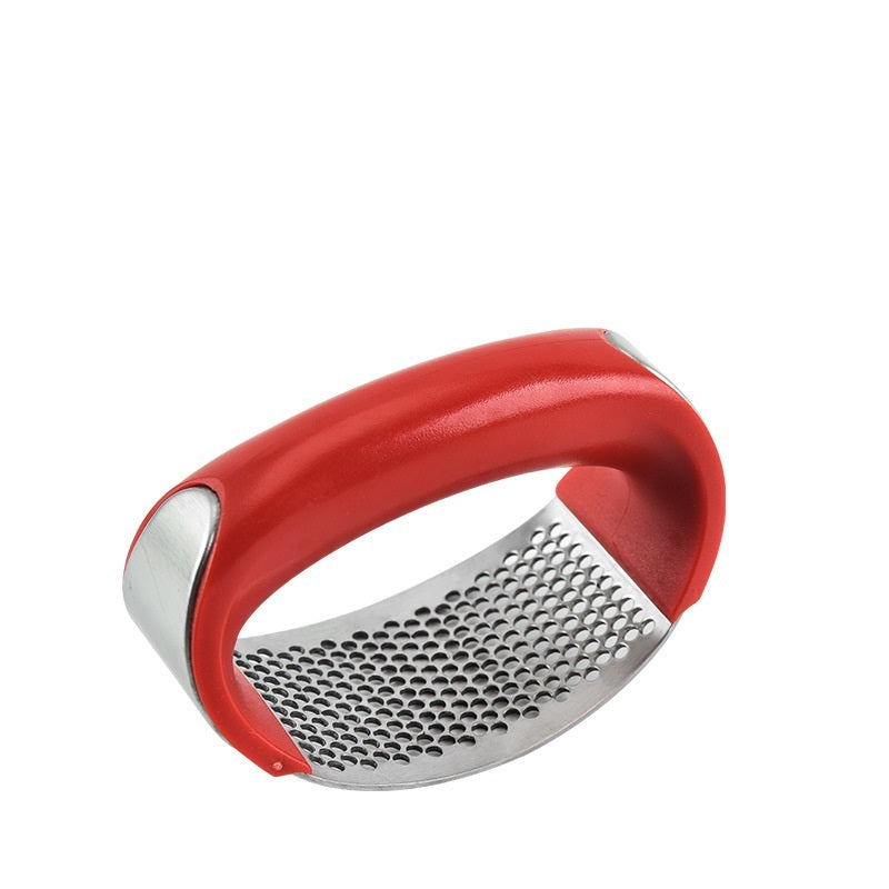 Crush garlic effortlessly with the sleek and ergonomic Stainless Steel Garlic Masher.